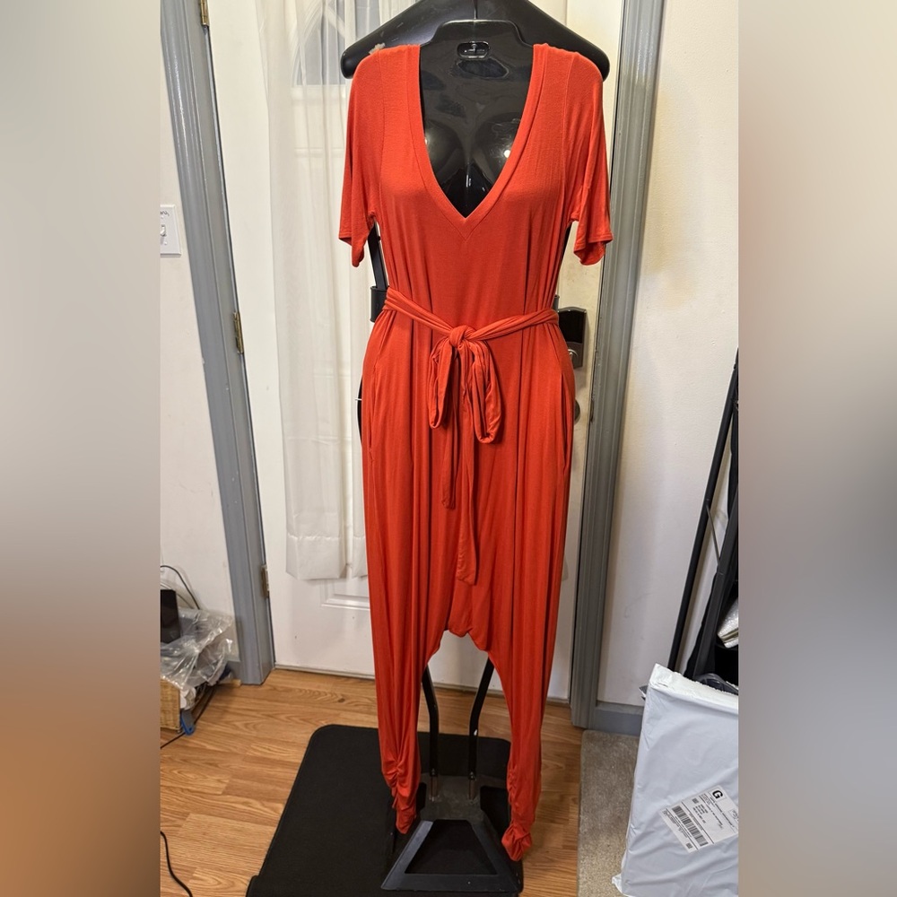 Fashion Nova Red/Orange Jumpsuit with Tie Waist and Wide-Leg Design